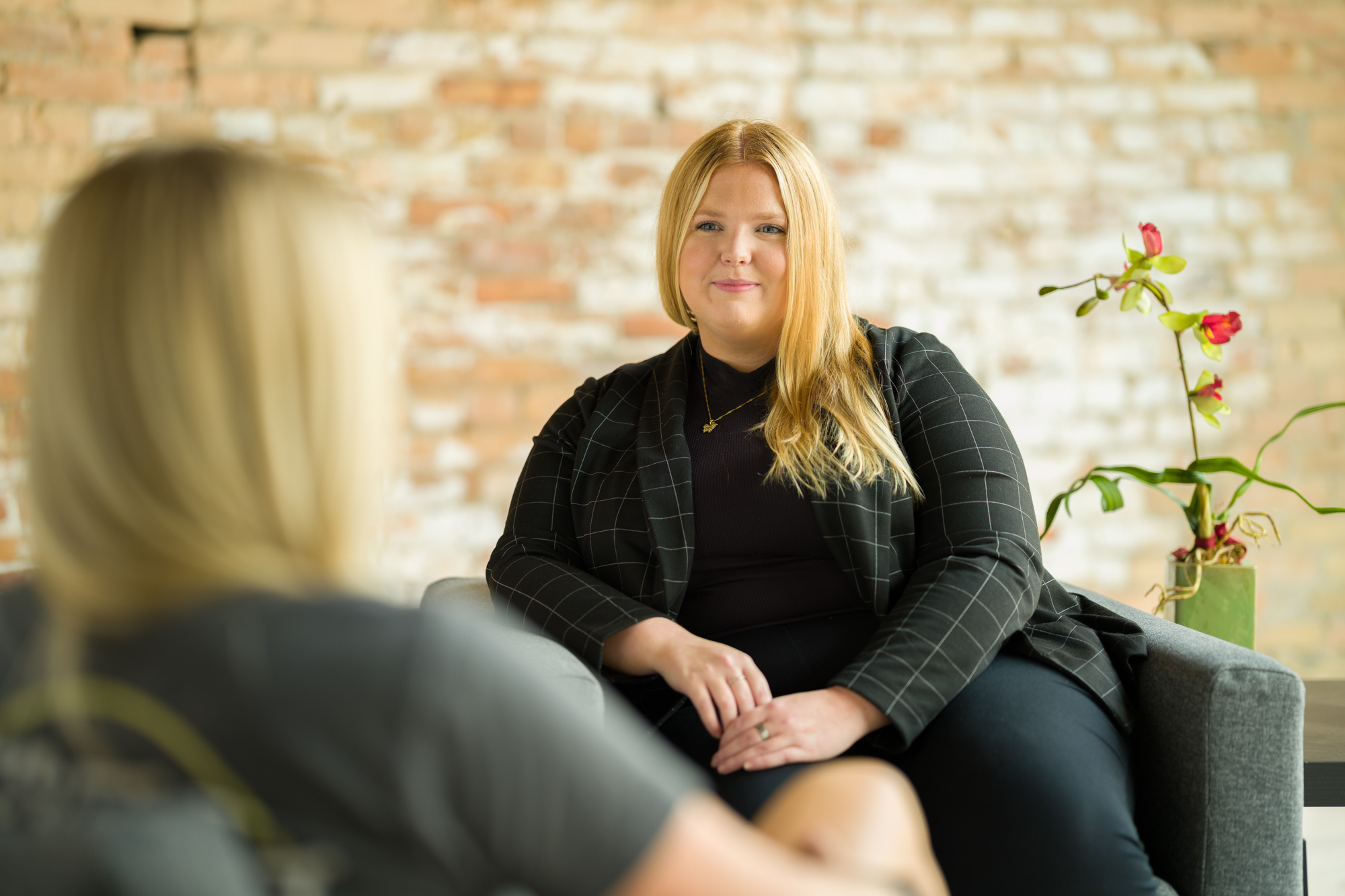 Unison housing staff offering one-on-one support for long-term success