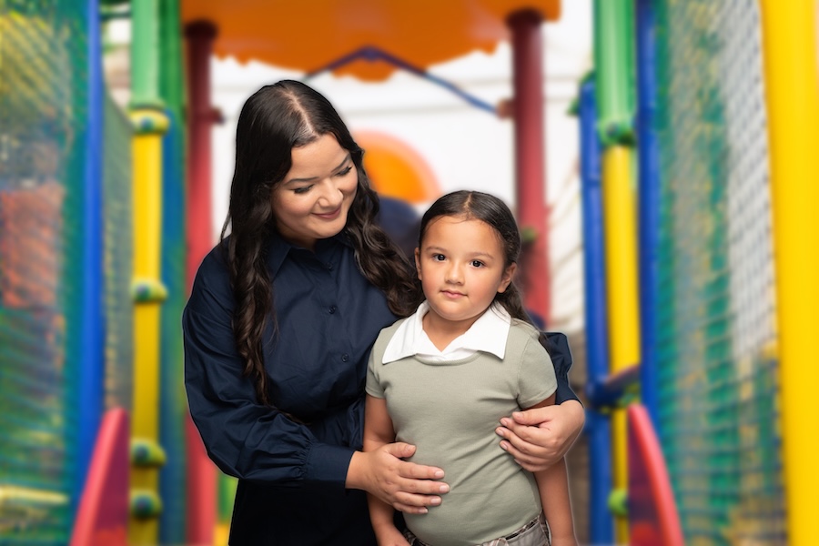 Unison MRSS team member comforting child during crisis response at playground